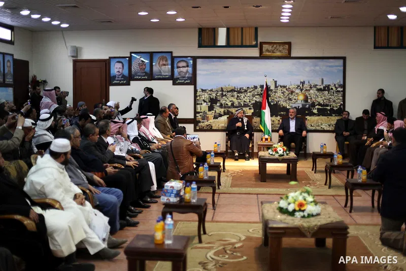 Palestinian Prime Minister in Gaza Ismail Haniyeh meets with the members of "Miles of Smiles 19" aid convoy in his office in Gaza City, on Feb. 04, 2013. Photo by Ashraf Amra