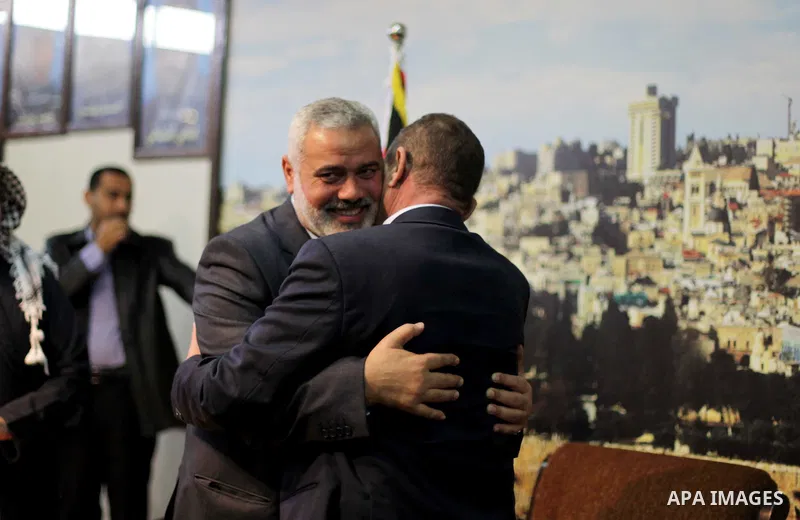 Palestinian Prime Minister in Gaza Ismail Haniyeh meets with the members of "Miles of Smiles 19" aid convoy in his office in Gaza City, on Feb. 04, 2013. Photo by Ashraf Amra