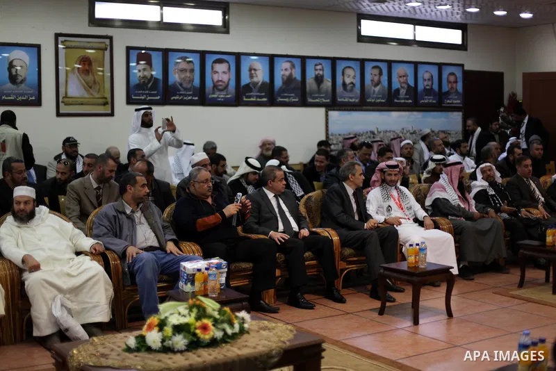 Palestinian Prime Minister in Gaza Ismail Haniyeh (not seen) meets with the members of "Miles of Smiles 19" aid convoy in his office in Gaza City, on Feb. 04, 2013. Photo by Ashraf Amra