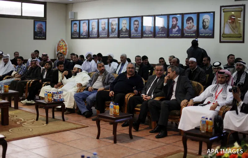 Palestinian Prime Minister in Gaza Ismail Haniyeh (not seen) meets with the members of "Miles of Smiles 19" aid convoy in his office in Gaza City, on Feb. 04, 2013. Photo by Ashraf Amra