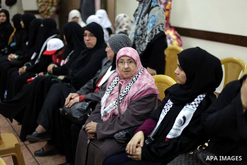 Palestinian Prime Minister in Gaza Ismail Haniyeh (not seen) meets with the members of "Miles of Smiles 19" aid convoy in his office in Gaza City, on Feb. 04, 2013. Photo by Ashraf Amra