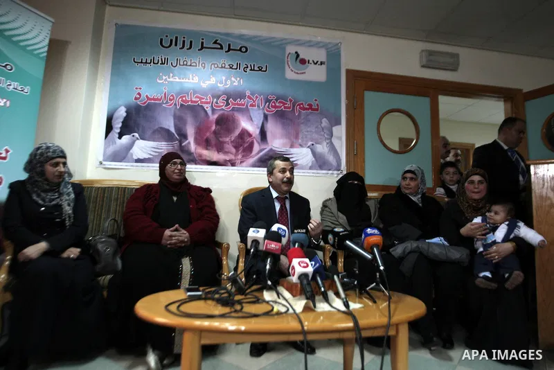 Doctor Salem Abu Khaizaran speaks during a press conference to announce for the succes artificial insemination operations after smuggling sperm samples from four Palestinian prisoners, in the West Bank city of Nablus on...