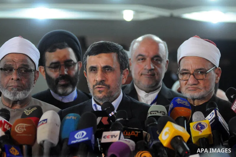 Iranian President Mahmoud Ahmadinejad gives a press conference following his meeting with Ahmed al-Tayeb (not seen) the Grand Imam of Cairo's Al-Azhar, Sunni Muslim Islam's highest seat of learning, in Cairo on February...