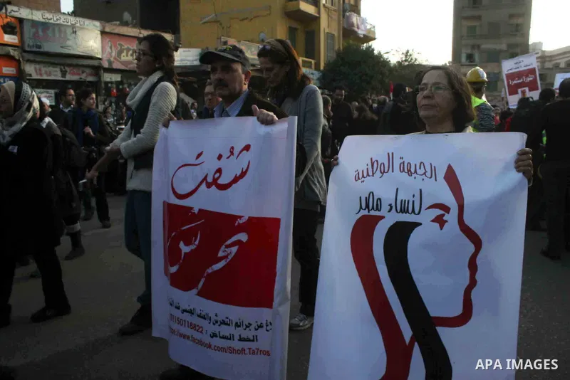 Egyptian women shout slogans during a protest march against sexual harassment and violence against women from Cairo's Sayyida Zeinab Square to the nearby Tahrir Square on February 6, 2013 in Cairo. Photo by Ahmed Asad