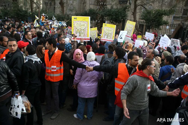 Egyptian women shout slogans during a protest march against sexual harassment and violence against women from Cairo's Sayyida Zeinab Square to the nearby Tahrir Square on February 6, 2013 in Cairo. Photo by Ahmed Asad