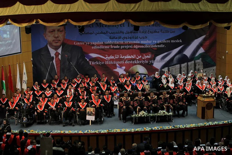 The Turkish Ambassador Shakir Aozhukan attends the graduation ceremony of the first batch of the project titled "Erada" in the Islamic University in Gaza city on Feb. 17, 2013. The project funded by the Turkish governmen...