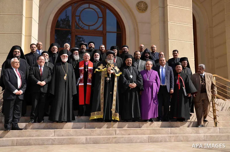 Egyptian representatives of Christian denominations pose following a meeting in Cairo on February 18, 2013. Representatives of several different Christian denominations present in Egypt met this morning in St Mark's Copt...