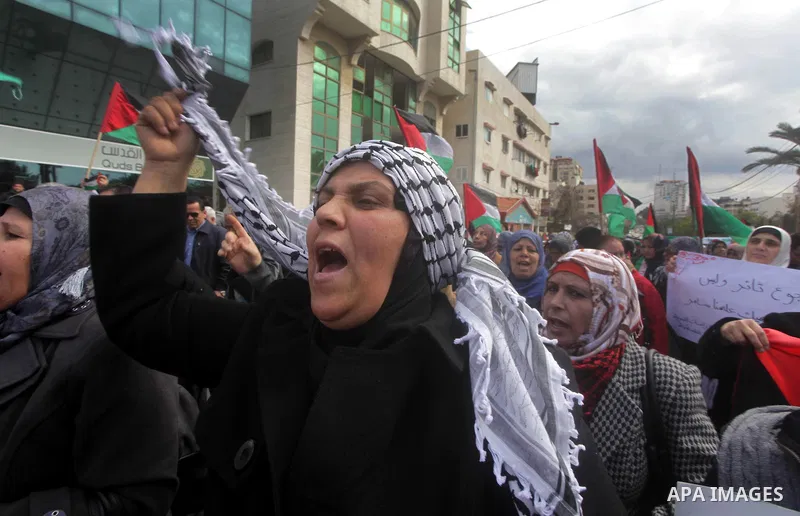 Palestinian women gather for a demonstration calling for the end of the political division between the Gaza Strip Hamas-led leadership and the Palestinian Authority Fatah-led in Gaza city, on Feb. 19, 2013. Photo by Ashr...