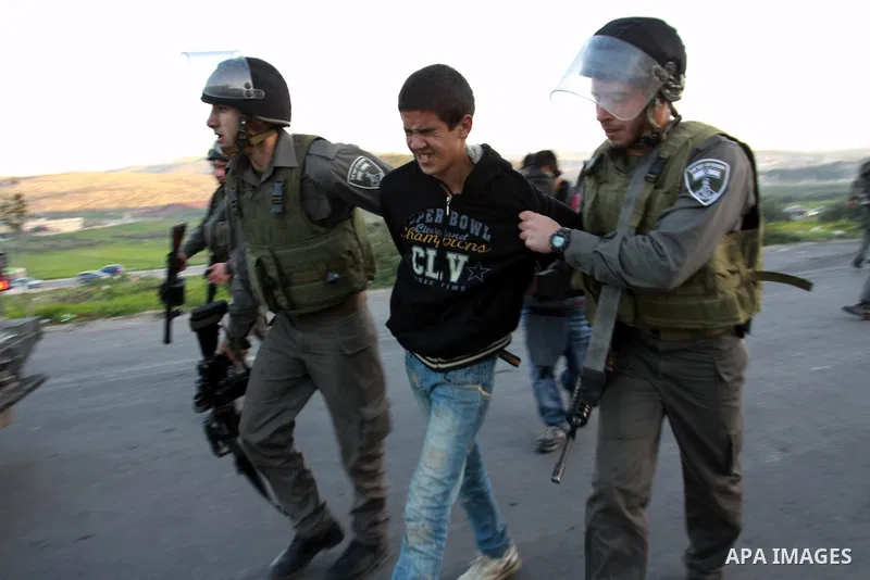 Israeli border police arrest a Palestinian demonstrator during clashes at Huwwara checkpoint near Nablus, the West Bank, 21 February 2013. According to Palestinian sources, 12 Palestinians were injured during the clashes...