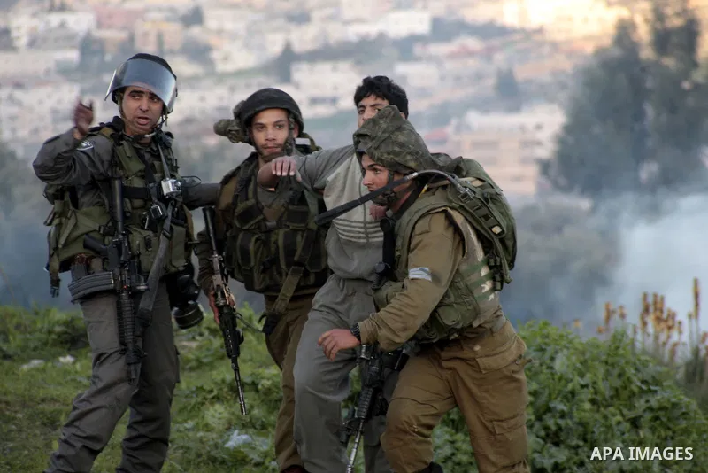 Israeli border police arrest a Palestinian demonstrator during clashes at Huwwara checkpoint near Nablus, the West Bank, 21 February 2013. According to Palestinian sources, 12 Palestinians were injured during the clashes...
