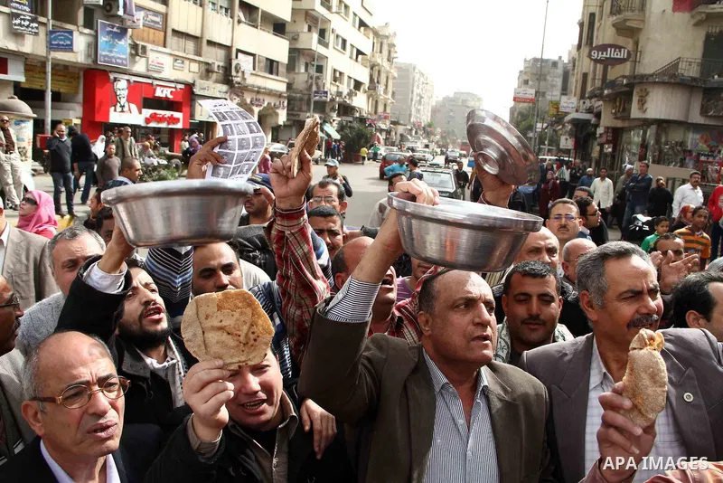 Najeeb Jabraeil, Head of the Egyptian Federation for Human Rights, takes part in a demonstration against the government of President Morsi, at Dawran Shubra near Cairo, Egypt, 22 February 2013. The opposition accuses Mor...