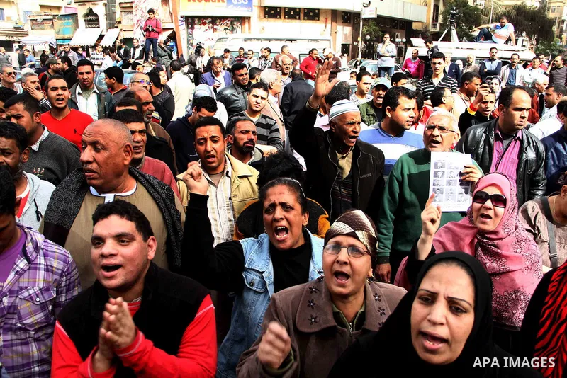 Egyptian protesters shout slogans during an anti-government demonstration against the government of President Morsi, at Dawran Shubra near Cairo, Egypt, 22 February 2013. The opposition accuses Morsi, Egypt's first democ...