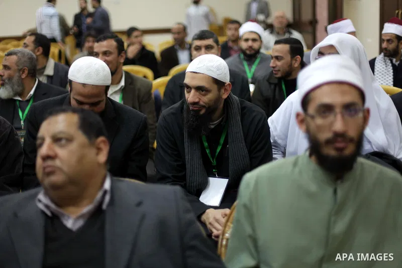 Palestinian Prime Minister in Gaza strip Ismail Haniyeh, (not seen) receives delegation of the preachers and Egyptian scientists, in Gaza city, on Feb. 23, 2013. Photo by Ashraf Amra