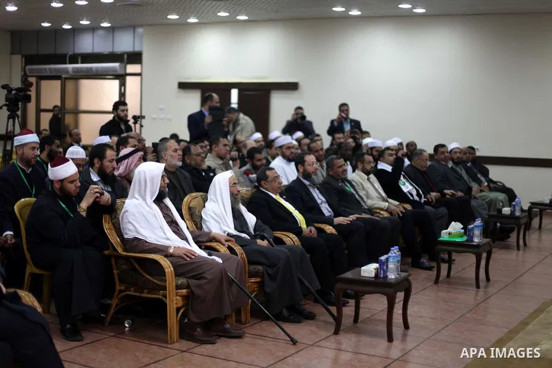 Palestinian Prime Minister in Gaza strip Ismail Haniyeh, (not seen) receives delegation of the preachers and Egyptian scientists, in Gaza city, on Feb. 23, 2013. Photo by Ashraf Amra
