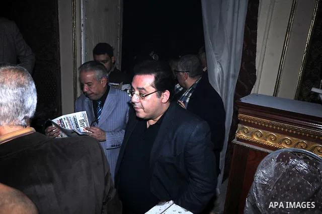A Egyptian Ayman Nour inspects the destruction after members of the Black Bloc group torched his office tomorrow El- thour party in downtown Cairo on February 22, 2013. Photo by Tareq Gabas