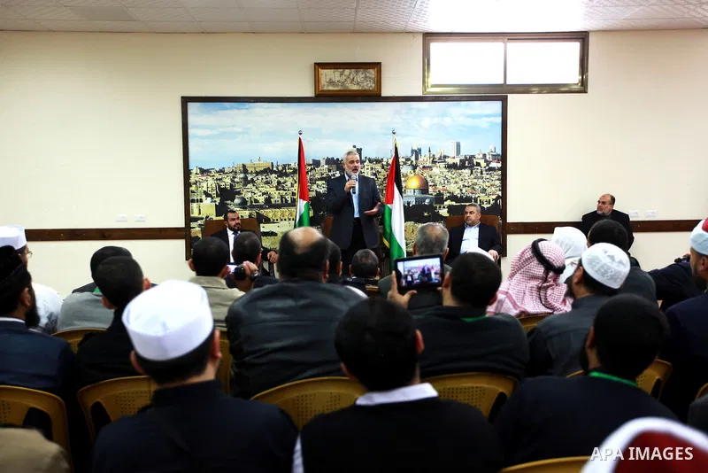 Palestinian Prime Minister in Gaza strip Ismail Haniyeh, receives preacher Salah Sultan, in Gaza city, on Feb. 23, 2013. Photo by Ahmed Shaat