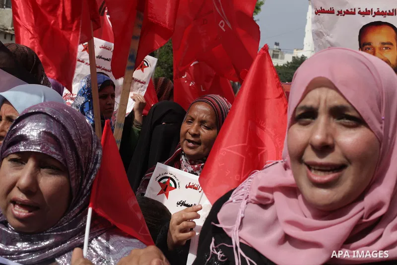 Supporters of the Palestinian Democratic Front protest in solidarity with Palestinian prisoners held in Israeli jails in Gaza city on Feb. 23, 2013. The demonstration was held in solidarity with Palestinian prisoner Same...