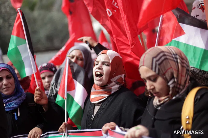 Supporters of the Palestinian Democratic Front protest in solidarity with Palestinian prisoners held in Israeli jails in Gaza city on Feb. 23, 2013. The demonstration was held in solidarity with Palestinian prisoner Same...