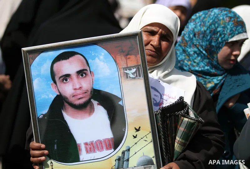 Palestinian women take part in a protest against the death of a Palestinian detainee in an Israeli jail, in Gaza City February 24, 2013. Palestinian officials on Saturday demanded an international investigation into the...