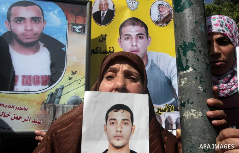 Palestinian women take part in a protest against the death of a Palestinian detainee in an Israeli jail, in Gaza City February 24, 2013. Palestinian officials on Saturday demanded an international investigation into the...