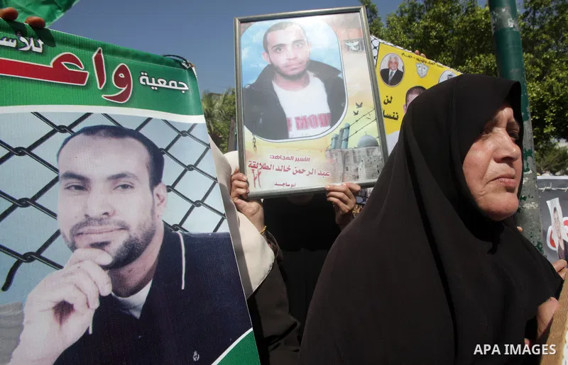 Palestinian women take part in a protest against the death of a Palestinian detainee in an Israeli jail, in Gaza City February 24, 2013. Palestinian officials on Saturday demanded an international investigation into the...