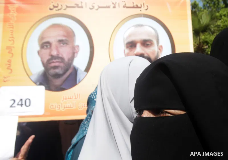 Palestinian women take part in a protest against the death of a Palestinian detainee in an Israeli jail, in Gaza City February 24, 2013. Palestinian officials on Saturday demanded an international investigation into the...