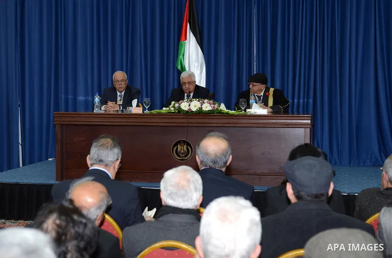 Palestinian President Mahmoud Abbas honors the Martyrs of the Research Center by the Order of Jerusalem in the West Bank city of Ramallah on February 25, 2013. Photo by Thaer Ganaim