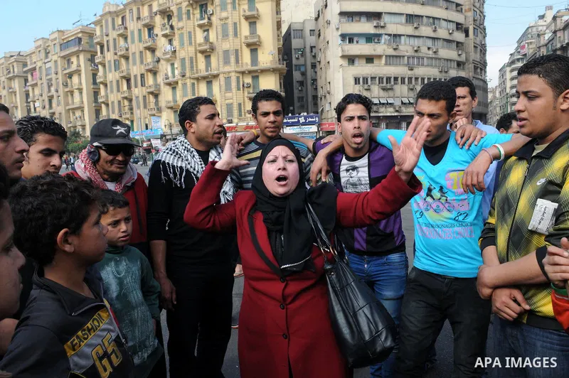 Egyptian protestors shout slogans against Egypt's President during an anti-government demonstration in Cairo's landmark Tahrir square on February 26, 2013. Photo by Tarek al-Gabas