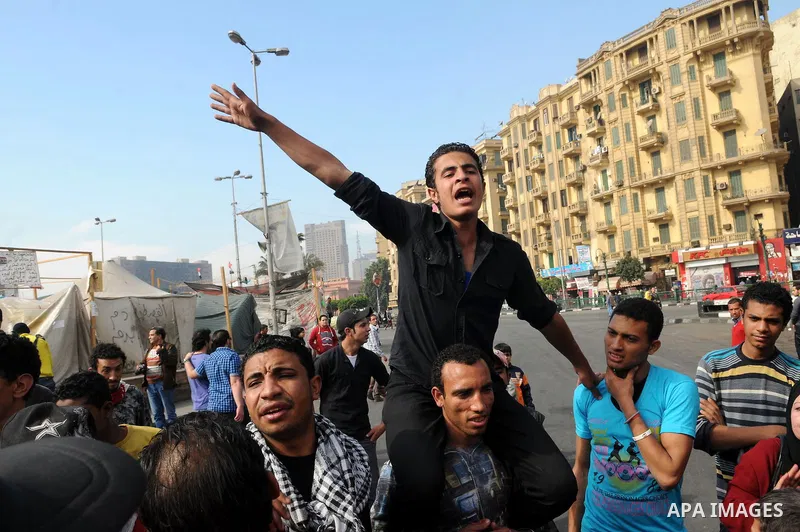 Egyptian protestors shout slogans against Egypt's President during an anti-government demonstration in Cairo's landmark Tahrir square on February 26, 2013. Photo by Tarek al-Gabas