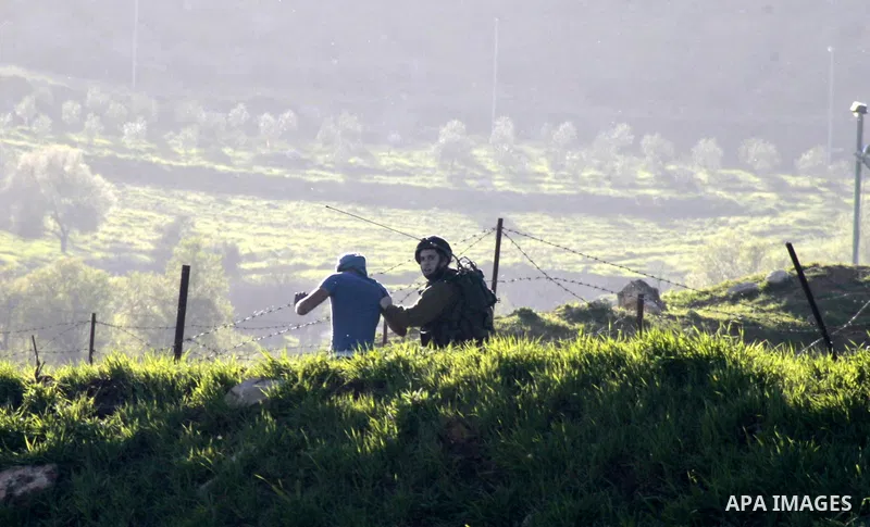 Israeli security forces detain a Palestinian protester during clashes at Hawwara military checkpoint near the West Bank city of Nablus on February 26, 2013. Increased protests in the West Bank after the killing of a Pale...