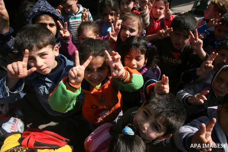 Palestinian children take part in a protest against the death of a Palestinian detainee in an Israeli jail, in Rafah city in the southern Gaza Strip on Feb. 27, 2013. Palestinian officials on Saturday demanded an interna...