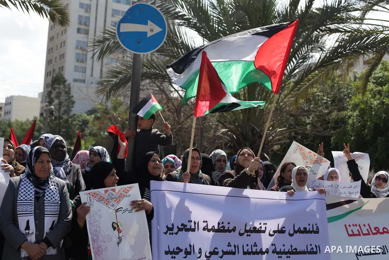 Palestinian women shout slogans as they march in Gaza City on March 05, 2013 during a rally for the International Women's Day which is celebrated worldwide on March 8. Photo by Ashraf Amra