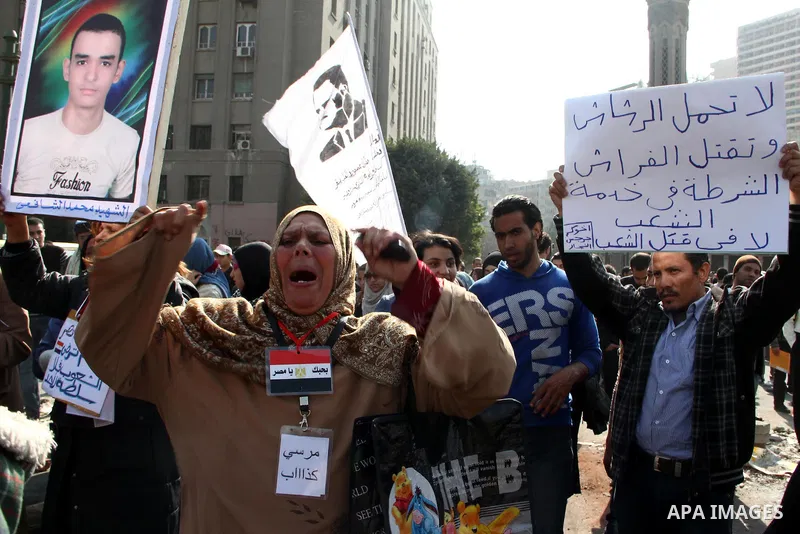 Egyptian protester shout slogans during the funeral of activist Mohamed al-Shafie, in Cairo, Egypt, 05 March 2013. According to local media sources, clashes broke out between mourners and police forces during the funeral...
