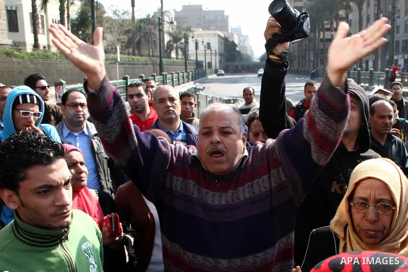 Egyptian protester shout slogans during the funeral of activist Mohamed al-Shafie, in Cairo, Egypt, 05 March 2013. According to local media sources, clashes broke out between mourners and police forces during the funeral...