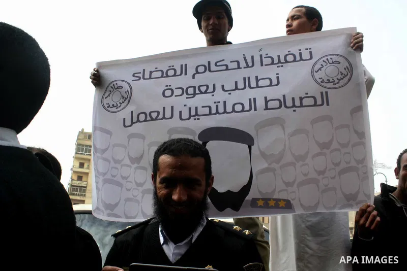 Egyptian protesters take part in a demonstration in support for bearded policemen, in front of al-Azhar mosque, Cairo, Egypt, 08 March 2013. Some bearded Policemen staged a sit-in earlier in the week in Cairo, demanding...