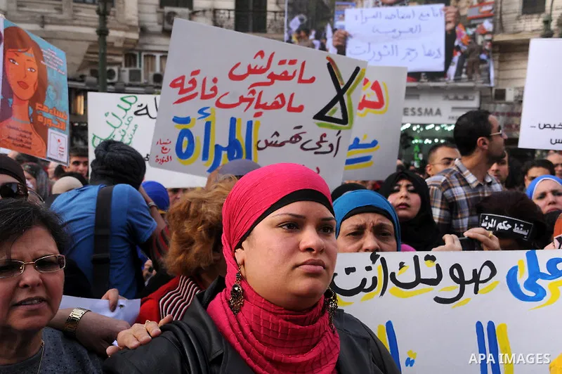Egyptian women chant slogans as they march in downtown Cairo to mark International Women's Day on March 8, 2013. Faced with a spike in sexual violence against female protesters, Egyptian women are overcoming stigma and r...