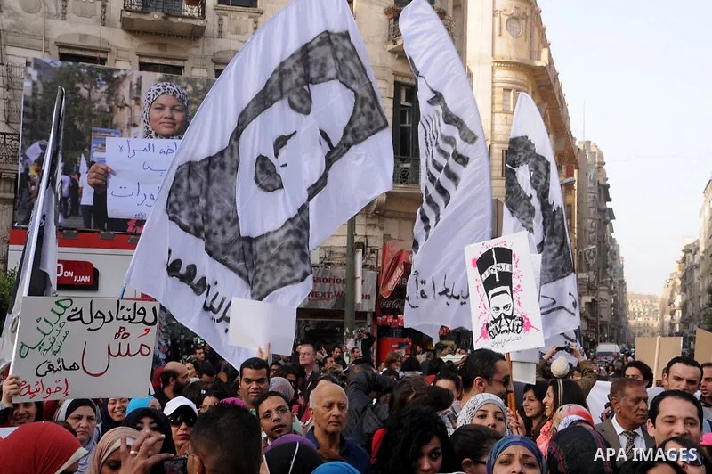 Egyptian women chant slogans as they march in downtown Cairo to mark International Women's Day on March 8, 2013. Faced with a spike in sexual violence against female protesters, Egyptian women are overcoming stigma and r...
