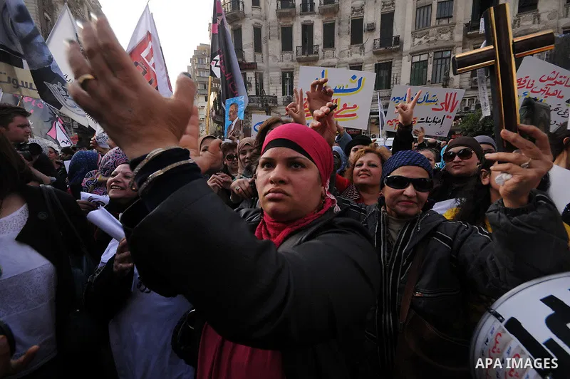 Egyptian women chant slogans as they march in downtown Cairo to mark International Women's Day on March 8, 2013. Faced with a spike in sexual violence against female protesters, Egyptian women are overcoming stigma and r...