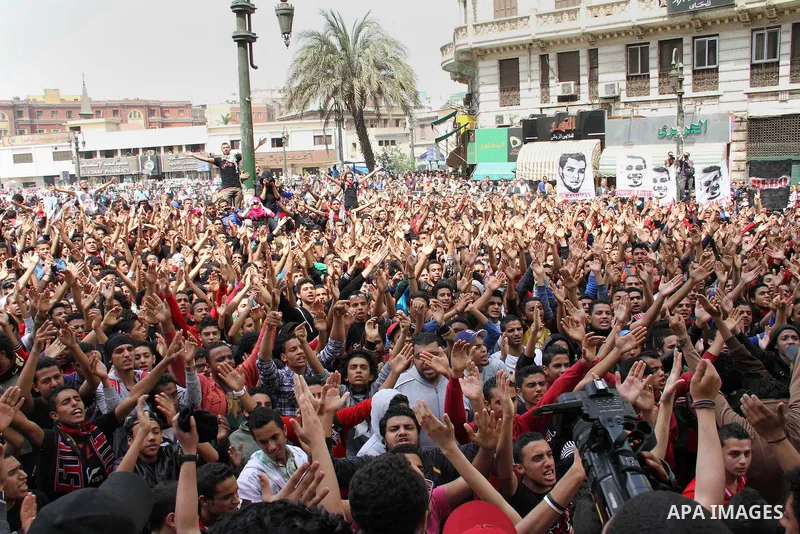 Supporters of Egypt's Al-Ahly football club protest outside the High Court in Cairo on March 16, 2013, demanding the release of fellow members of their Ultras hardcore fan group. The Ultras have long had strained relatio...