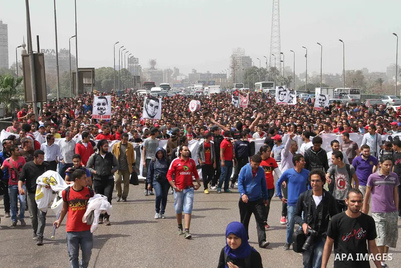 Supporters of Egypt's Al-Ahly football club protest outside the High Court in Cairo on March 16, 2013, demanding the release of fellow members of their Ultras hardcore fan group. The Ultras have long had strained relatio...