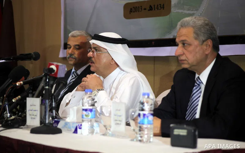 Palestinian Minister of Works and Housing in Gaza strip Yousef al-Ghrez, and Qatari ambassador Mohammed al-Emadi attend the signing ceremony of agreement to start building the project of Hamad ben Khalifa city and recons...