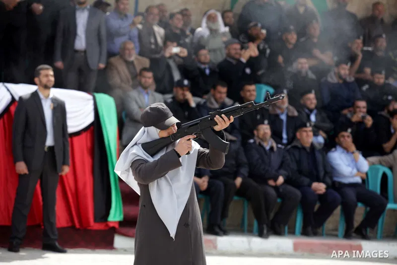 A Palestinian policewoman shows her skills during a police graduation ceremony at a police academy in Gaza City March 19, 2013. Photo by Ashraf Amra