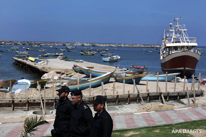 Palestinian police guard during a press conference to discuss Israel's apology to Turkey in the port of Gaza City on March 27, 2013. Israeli Prime Minister Benjamin Netanyahu apologised to Turkey on March 22, for a deadl...