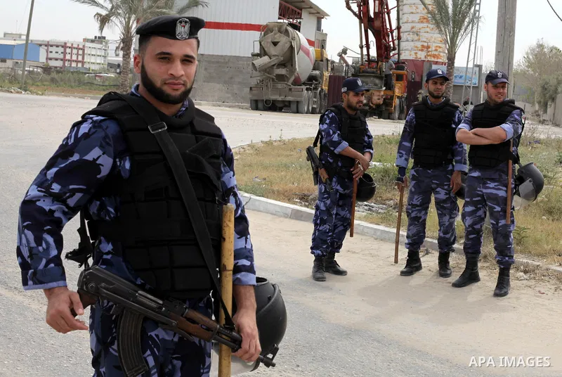 Palestinians police stand in a rally marking Land Day in Beit Hanun in the northern Gaza Strip on March 30, 2013. Land Day commemorates the death of six Arab Israeli protesters at the hands of Israeli troops during mass...