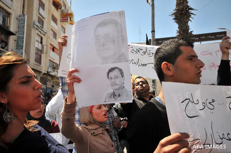 Palestinians take part a protest in the West Bank city of Ramallah, 02 April 2013, after the news of the death of Maysara Abu Hamdiyeh in the Israeli Soroka hospital. Reports state that Maysara Abu Hamdiyeh died after be...