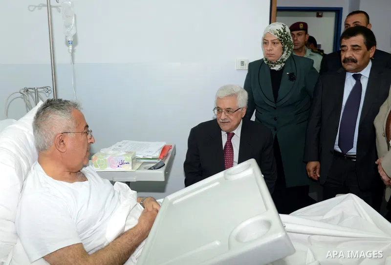 Palestinian President Mahmoud Abbas, visits Palestinian Prime Minister Salam Fayyad in a Ramallah, West Bank hospital, 02 April 2013. Fayyad was admitted to hospital last night with stomach pains from an abdominal infect...