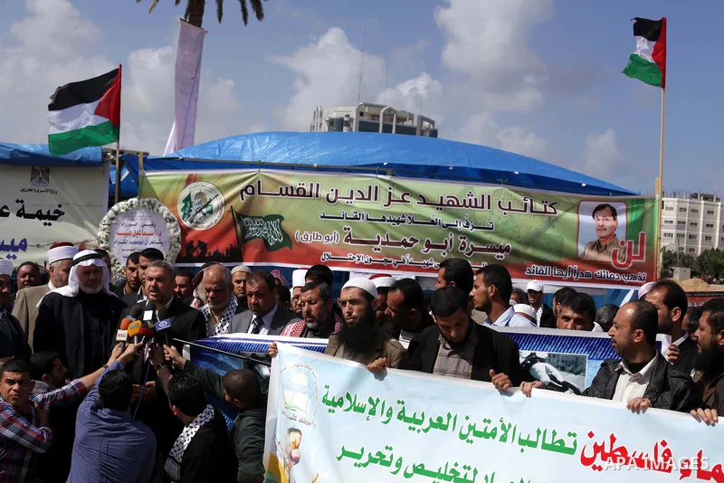 Palestinian Minister of Religious Affairs in Gaza strip Ismail Radwan, speaks during a protest for palestinian prisoner Maisara Abu Hamdiyeh, in Gaza city on April 4, 2013, who was suffering from throat cancer and died a...
