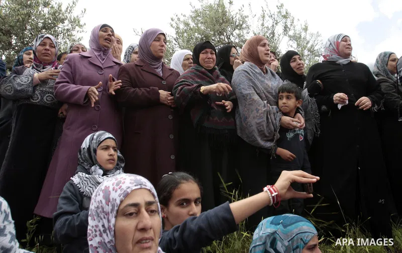 Palestinian relatives of the bodies of Amer Nassar and Naji Balbisi during their funeral in Anabta village near the West Bank city of Tulkarem, 04 April 2013. Israeli soldiers shot dead two Palestinian protesters in the...