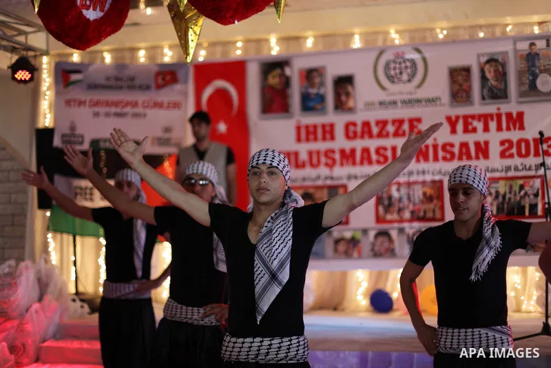 Turkish humanitarian relief IHH, organize a ceremony to mark "World Orphan Day" in Gaza City, on April 6, 2013. Photo by Ashraf Amra