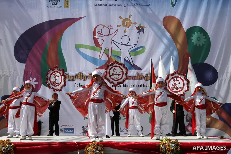 Palestinian children take part in a celebration to mark the International Children Day in Gaza city on April, 07, 2012. Photo by Mohammed Asad
